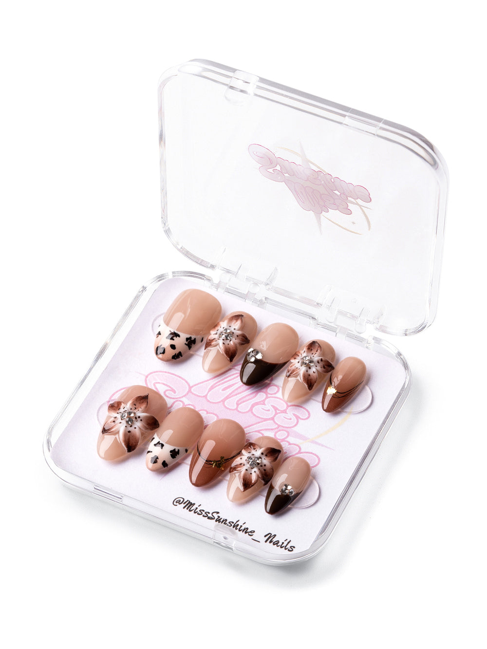 Short almond nails with nude and brown floral art