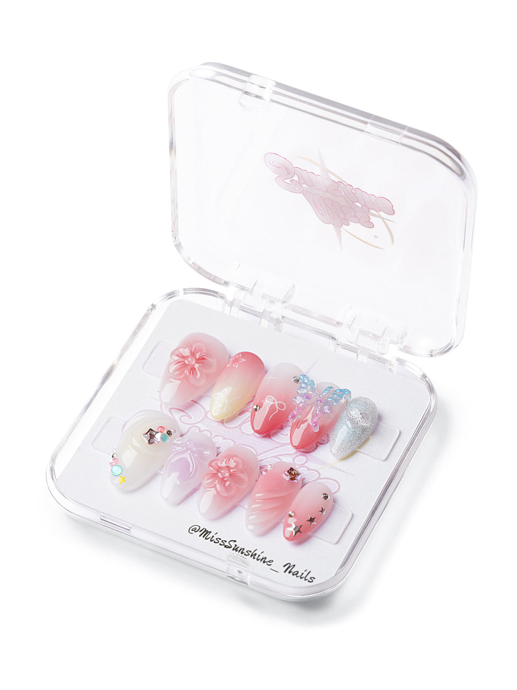 Short almond nails with pink gradient and 3D flowers