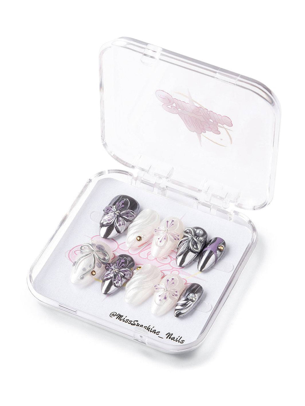 Medium-long almond nails with silver chrome and 3D flowers