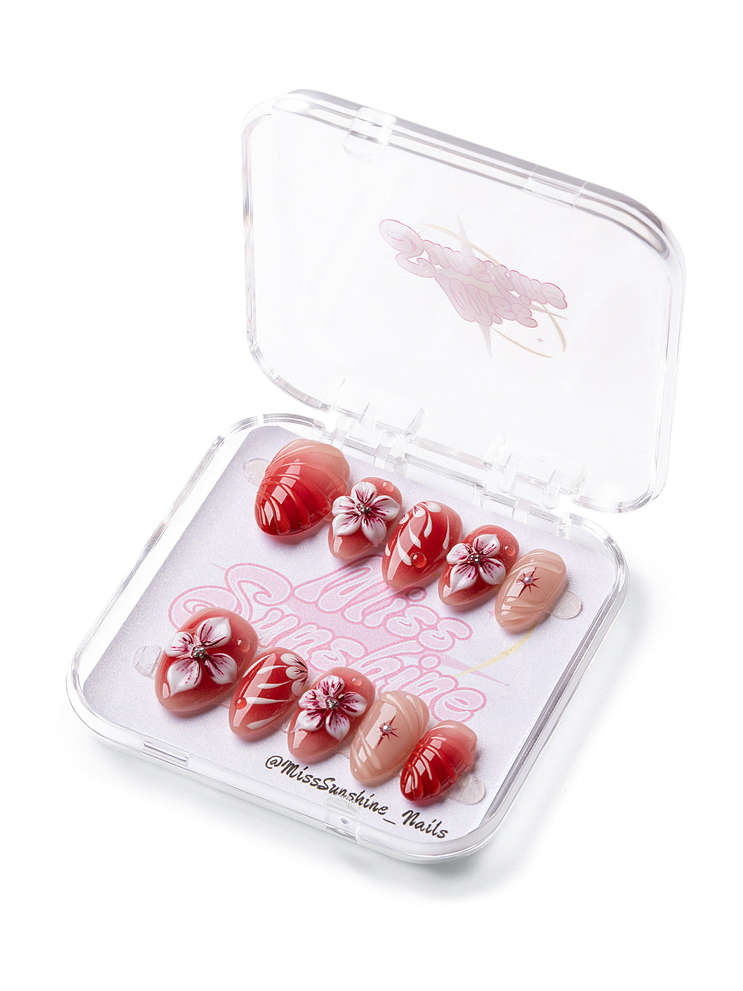 Extra short almond press-on nails in red and nude with floral design