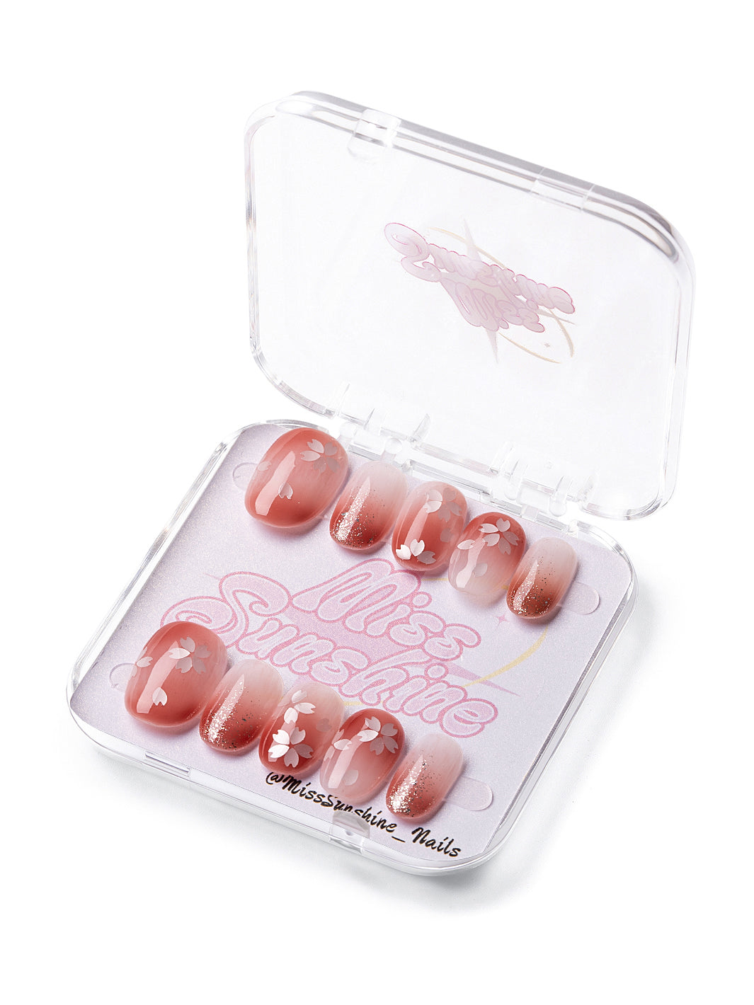 Short oval nails with soft pink and white floral design