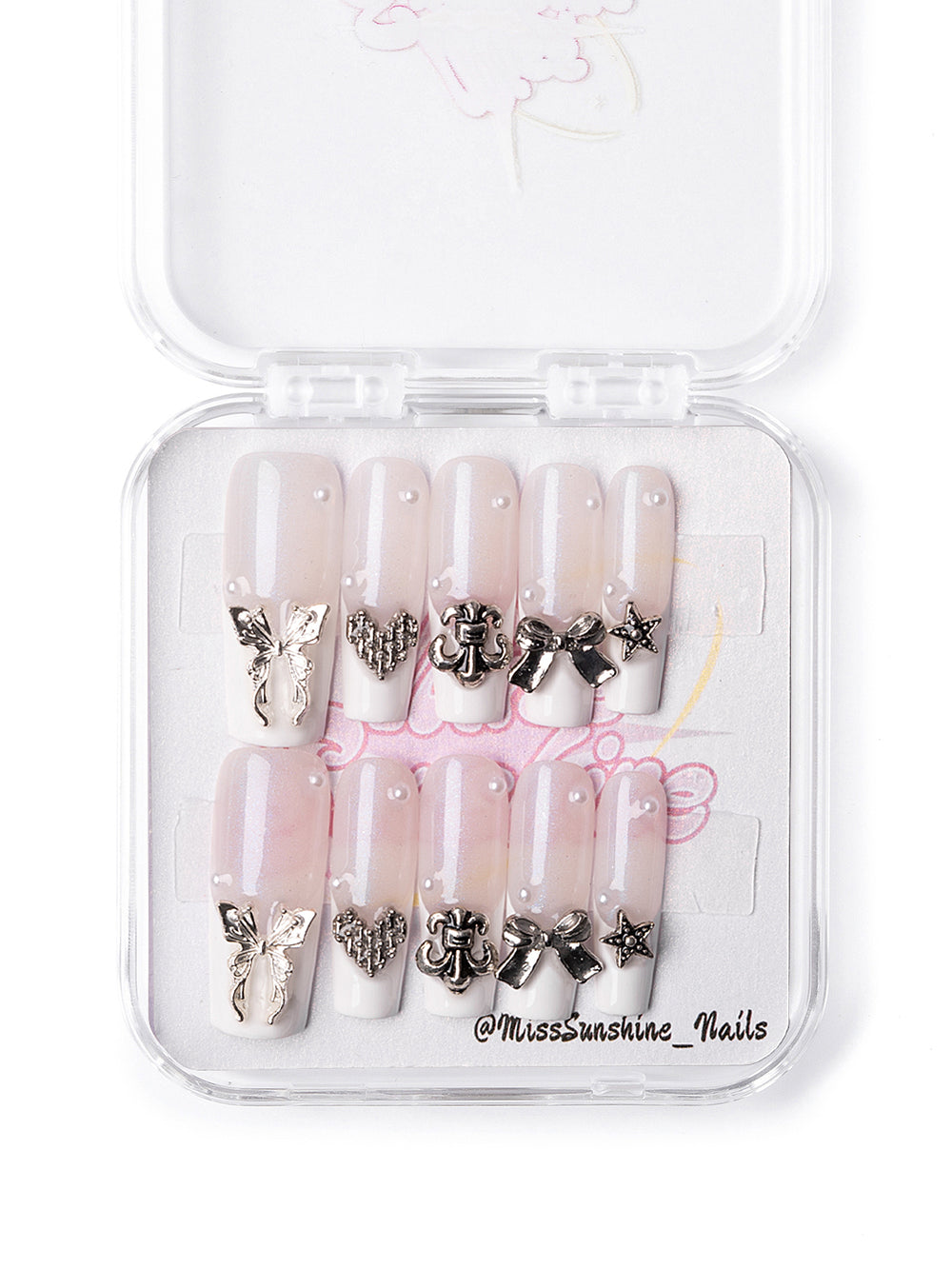 Press-on French tips with butterfly, bow, and heart details