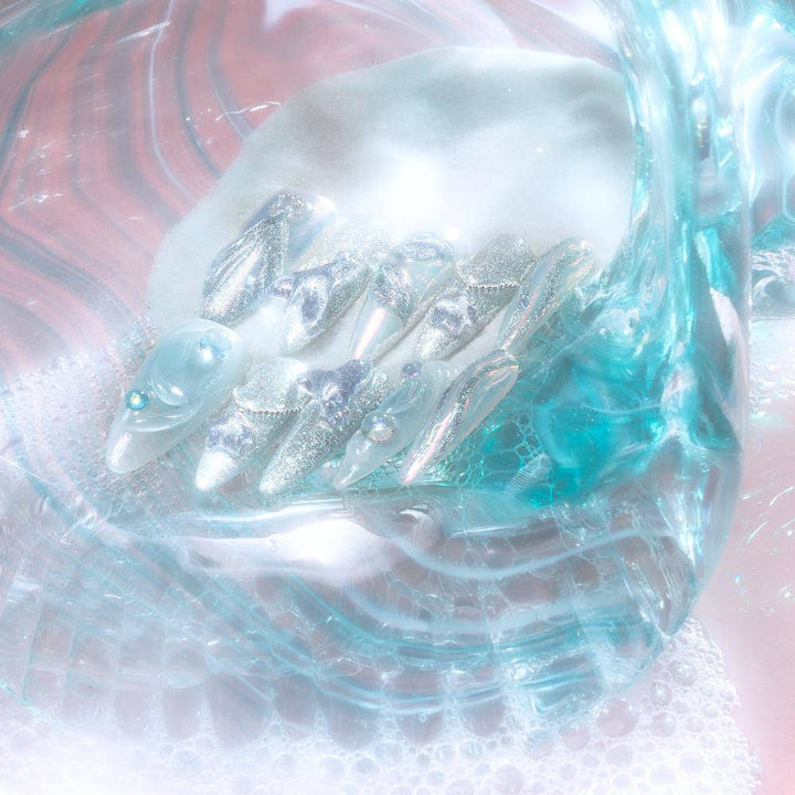 Futuristic blue nails with swirled texture