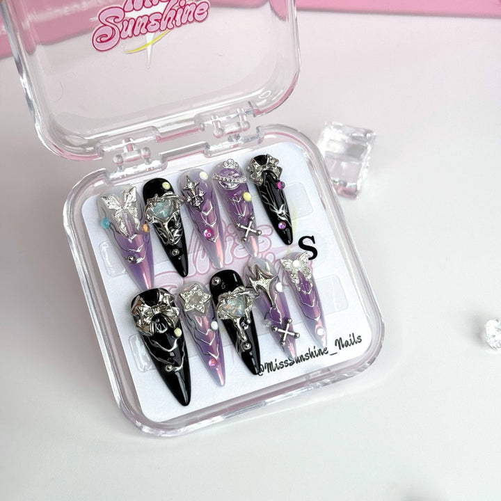 3D metallic bow and star nail embellishments