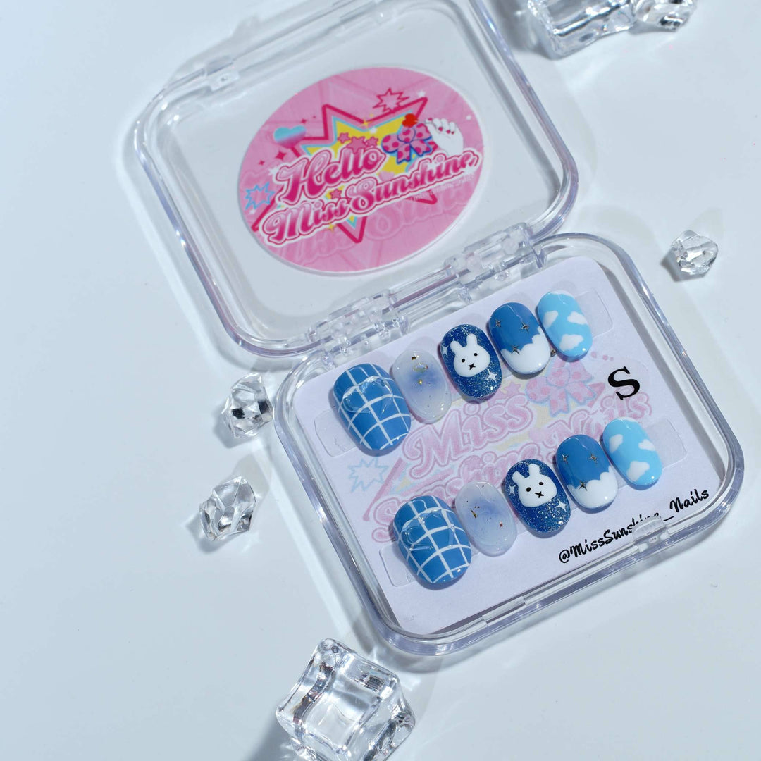 K-pop themed nails with cute star glitter