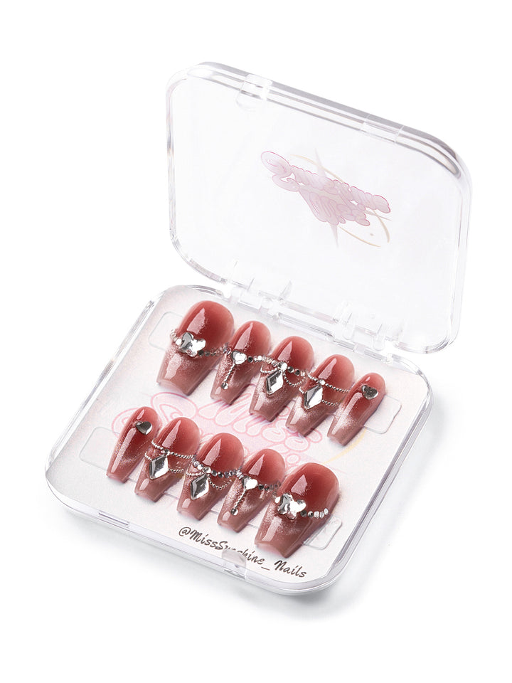 Medium-long coffin nails with rose shimmer