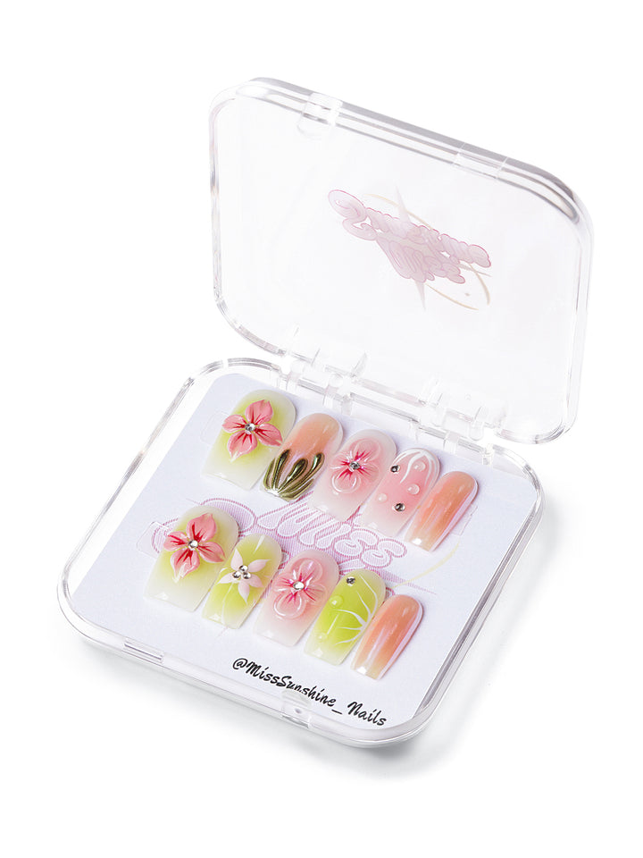 Medium square press-on nails with pink and green tropical tones, 3D flowers, and glossy chrome details