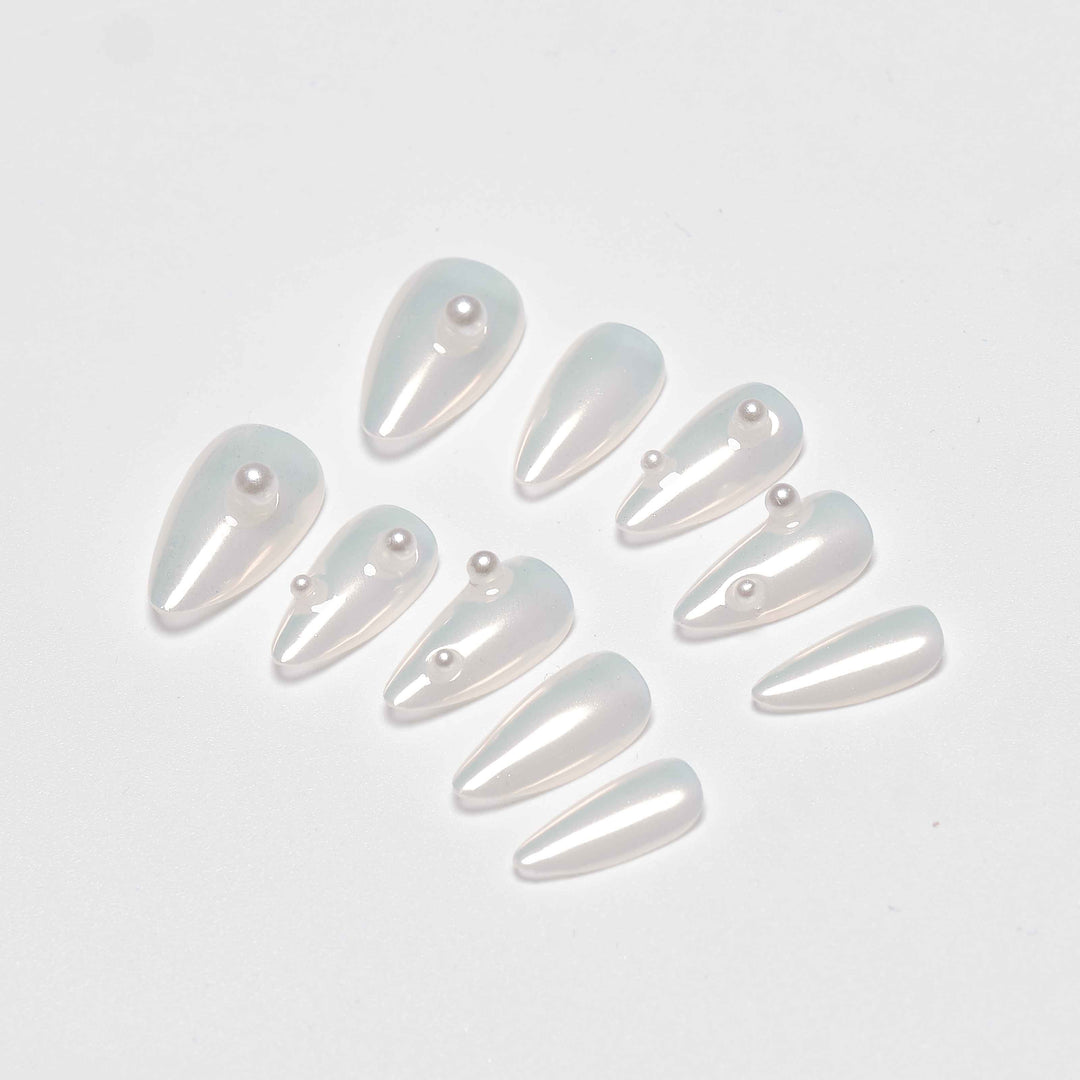 Short almond nails with chrome pearl glaze shine