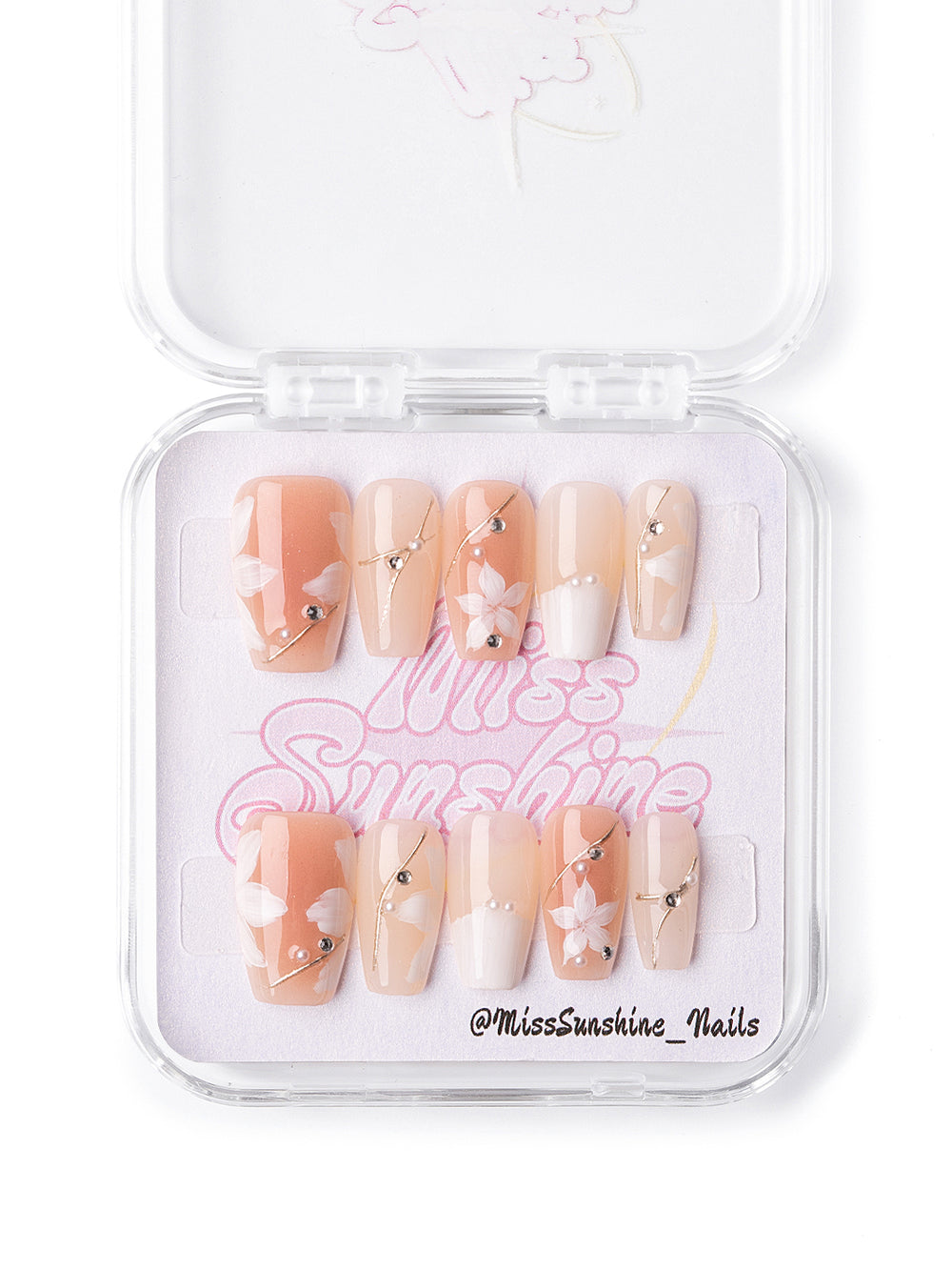 Short white nails featuring hand-painted flower details