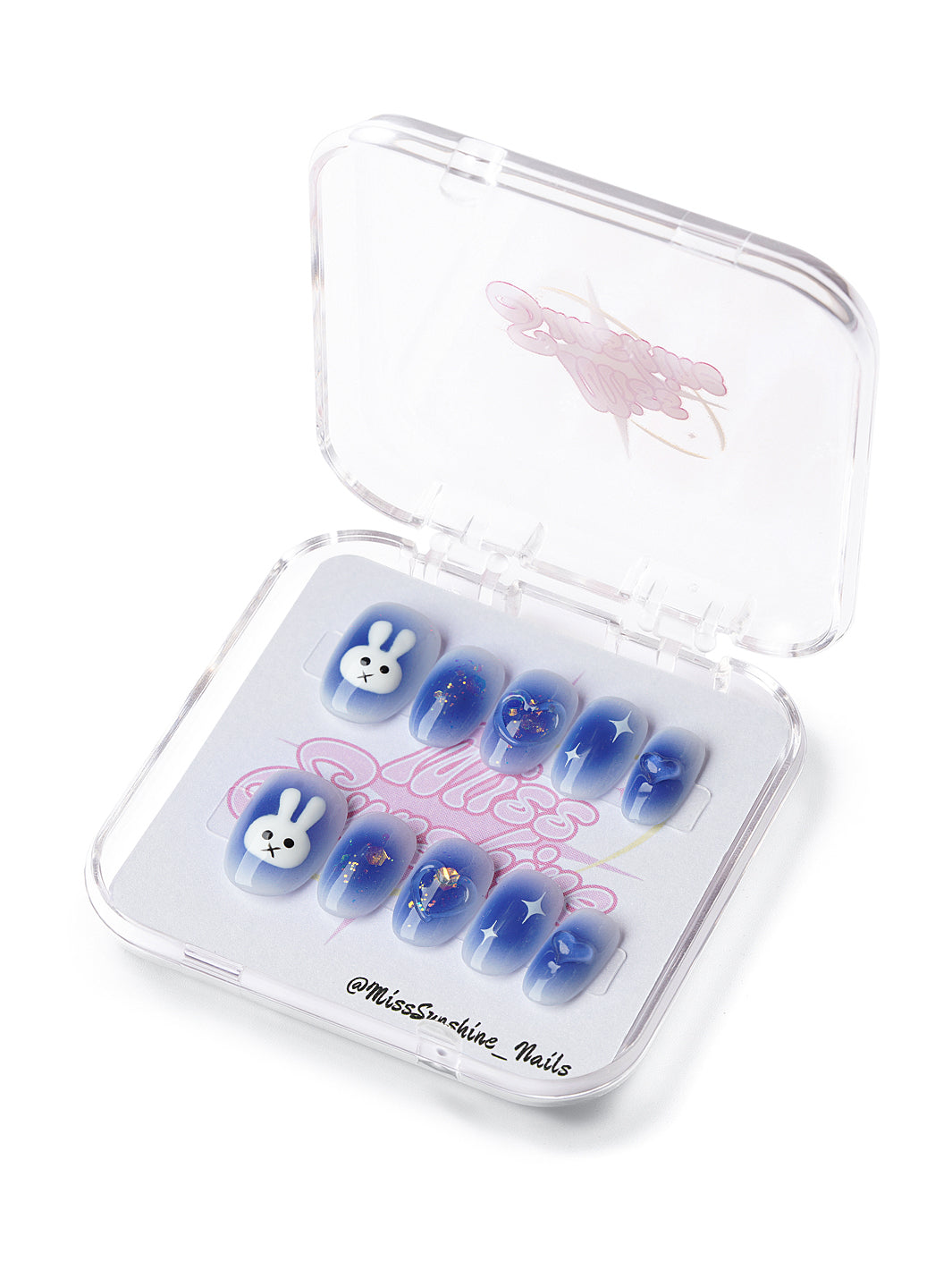 Handmade kawaii press on nails in soft blue with sparkles and bunny character