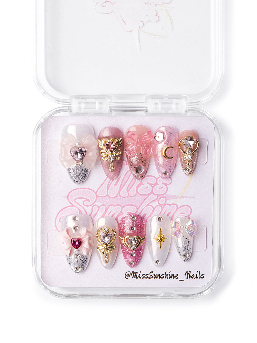 Sailor Moon coquette nails with pink sparkle
