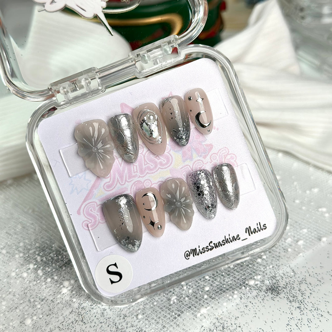 Extra short almond nails with frosty silver foil