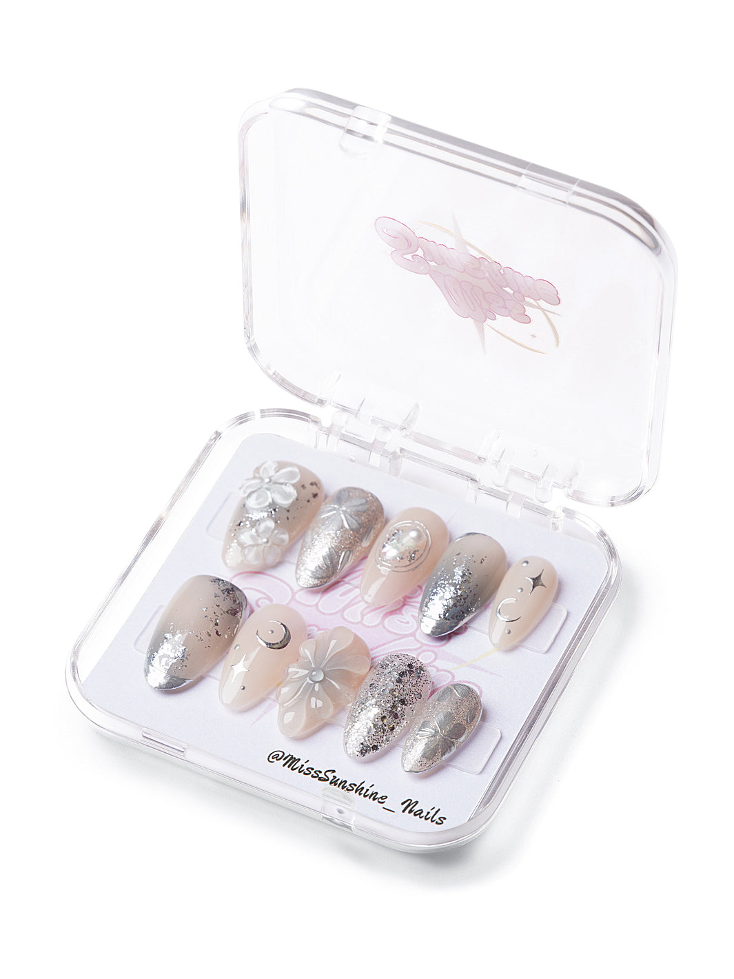Short almond nails with silver chrome tips and 3D flowers