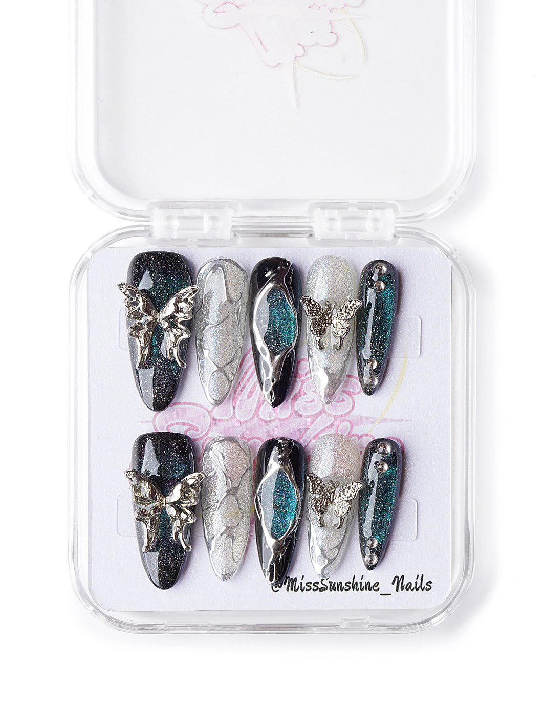 Long almond Halloween nails in black, jade, and silver glitter