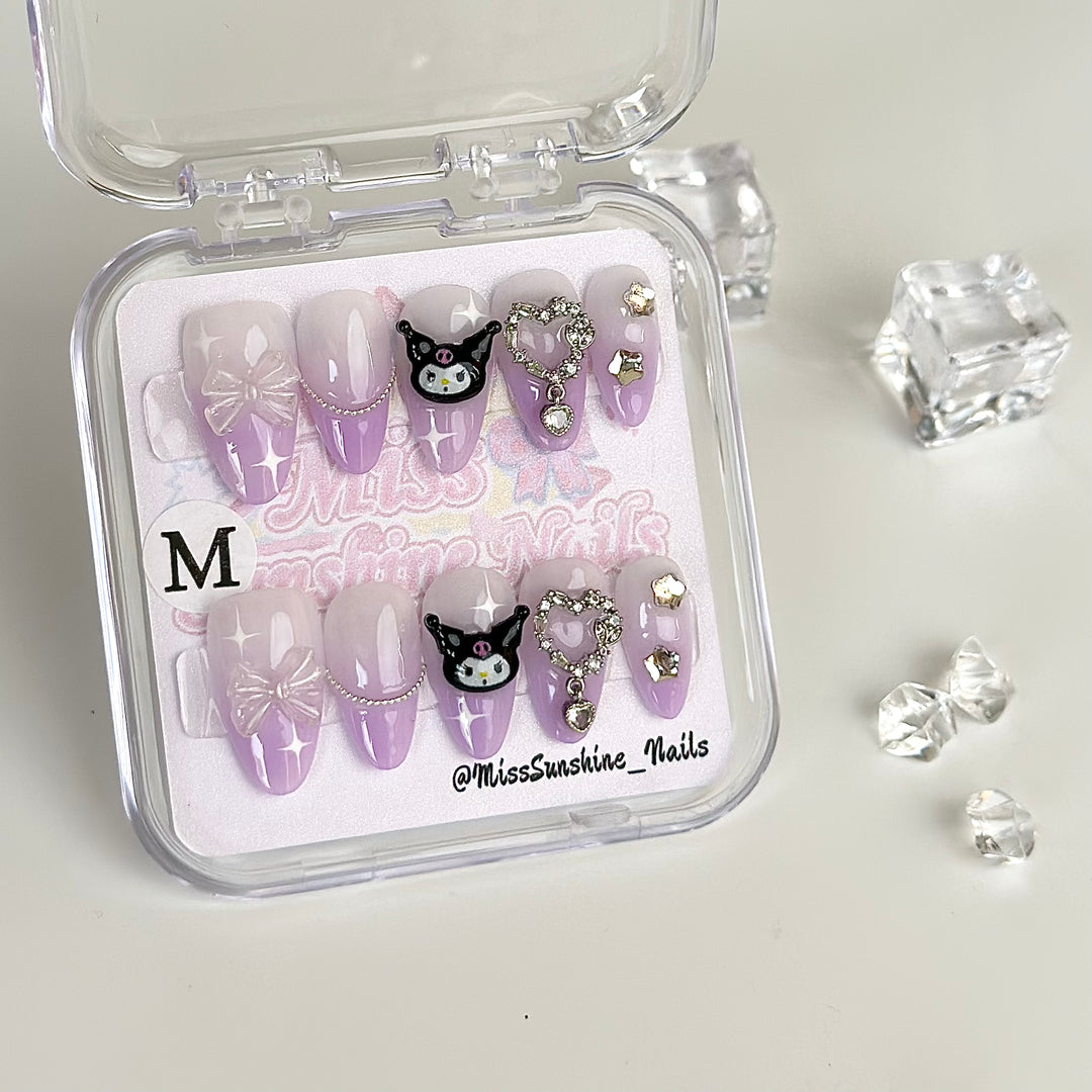 Kuromi themed nails with pink chrome design