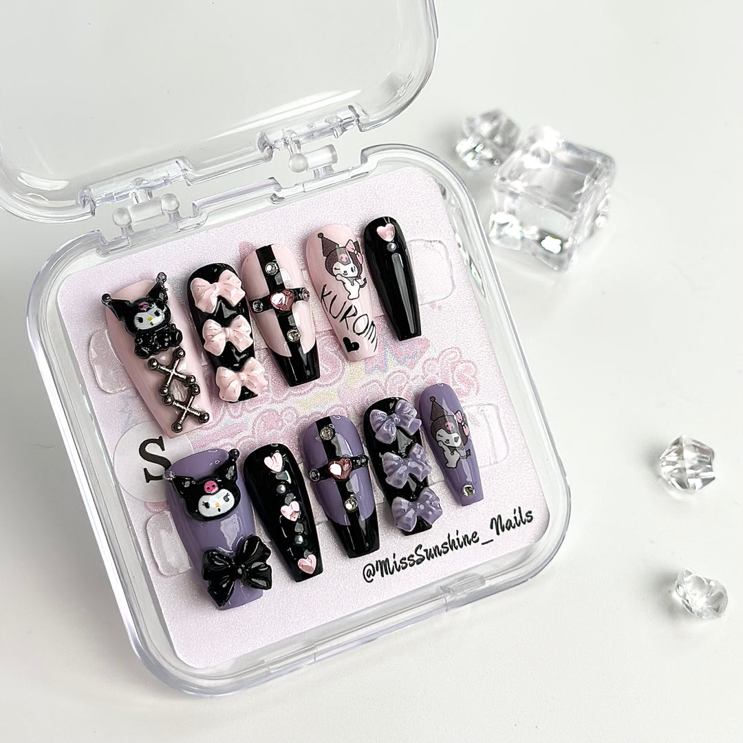 Kuromi themed nails with pink chrome design