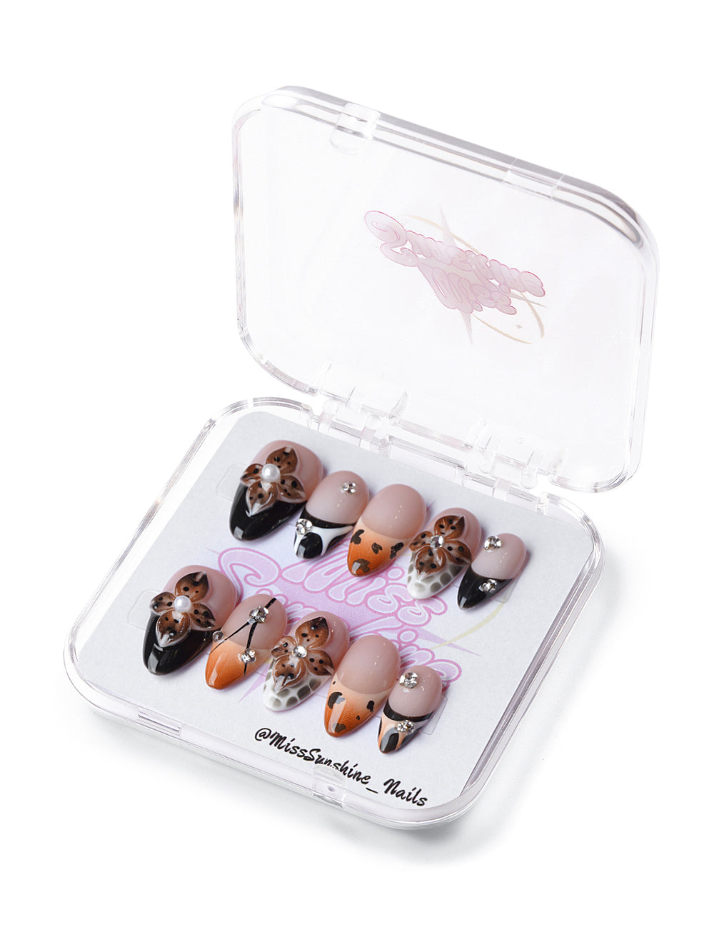 Short almond press-on nails with nude base and leopard floral art