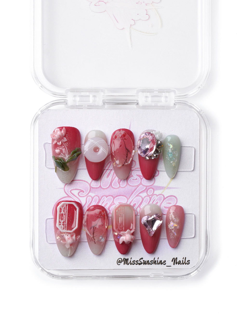 Handmade floral press-on nails available in short almond and medium coffin with artistic lotus-inspired design.