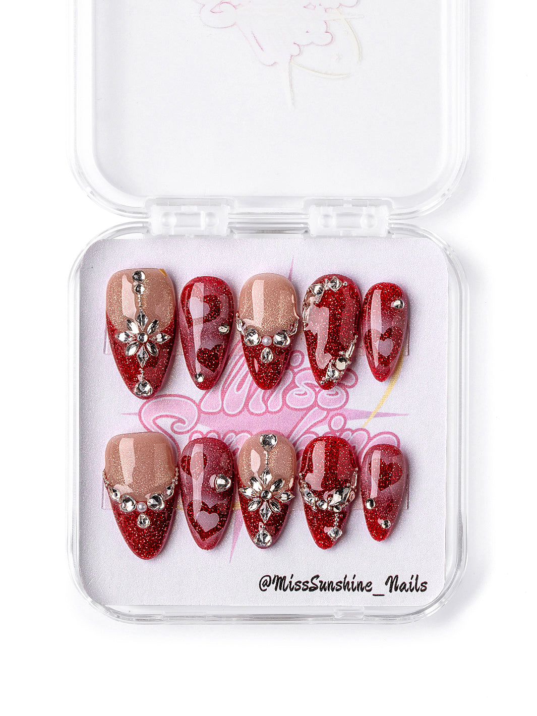 Red glitter heart press-on nails with diamond-like crystals for Valentine’s Day