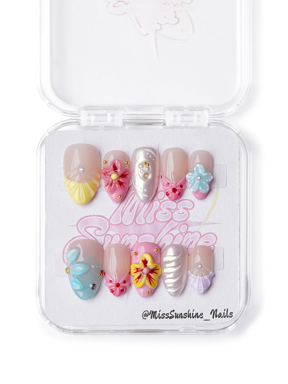 Handmade extra short almond nails with tropical florals, chrome shells, and pearl accents