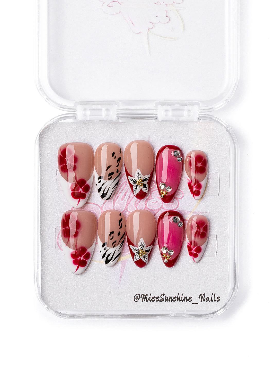 Tropical-inspired press-on nails with floral and animal prints in short almond