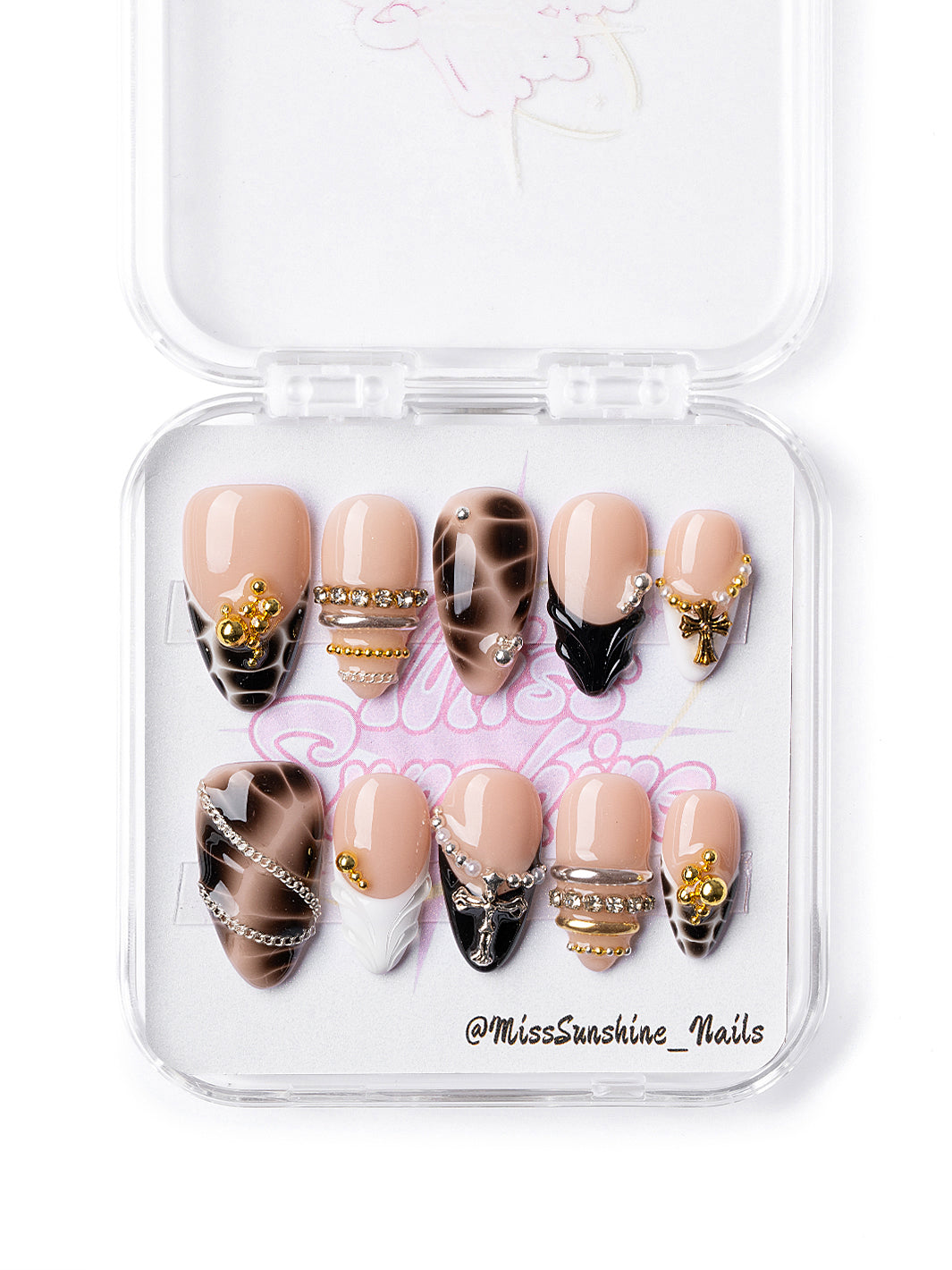 Mocha Cross press-on nails with tortoise shell design and gold embellishments