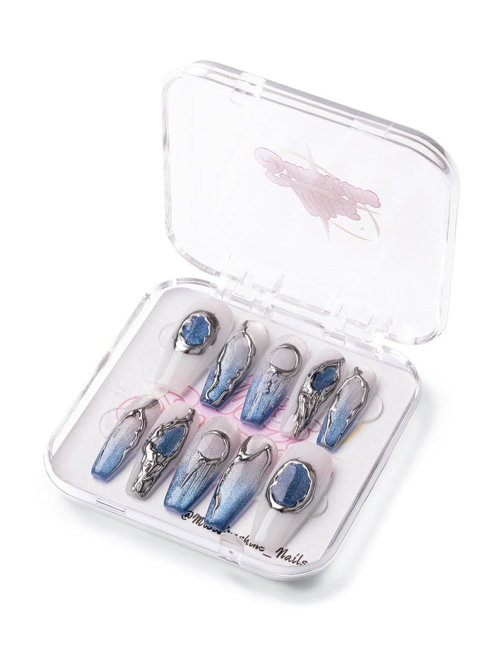Blue silver ombré nails with chrome drips