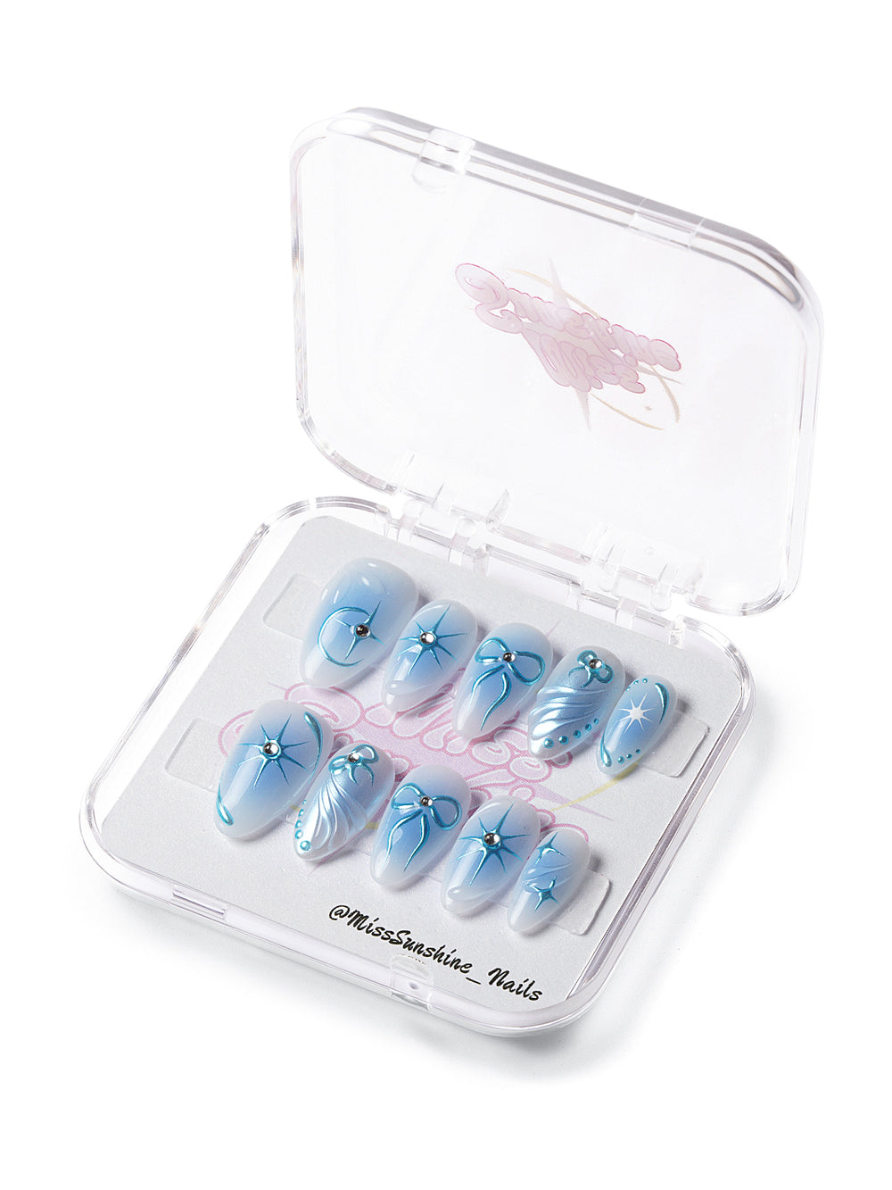 Short almond nails with metallic blue starbursts, bows, and icy chrome details