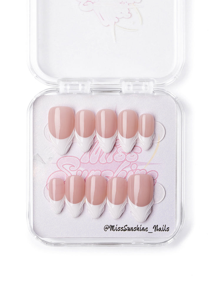 Nude base with white sculpted tips