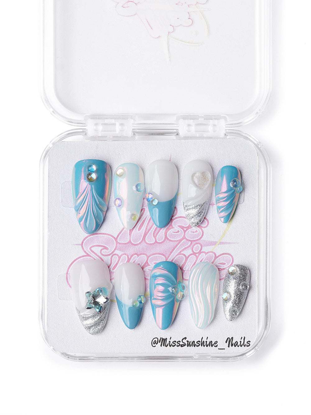 Short almond press-on nails with ocean blue chrome, silver glitter, and 3D mermaidcore accents from Miss Sunshine Nails.