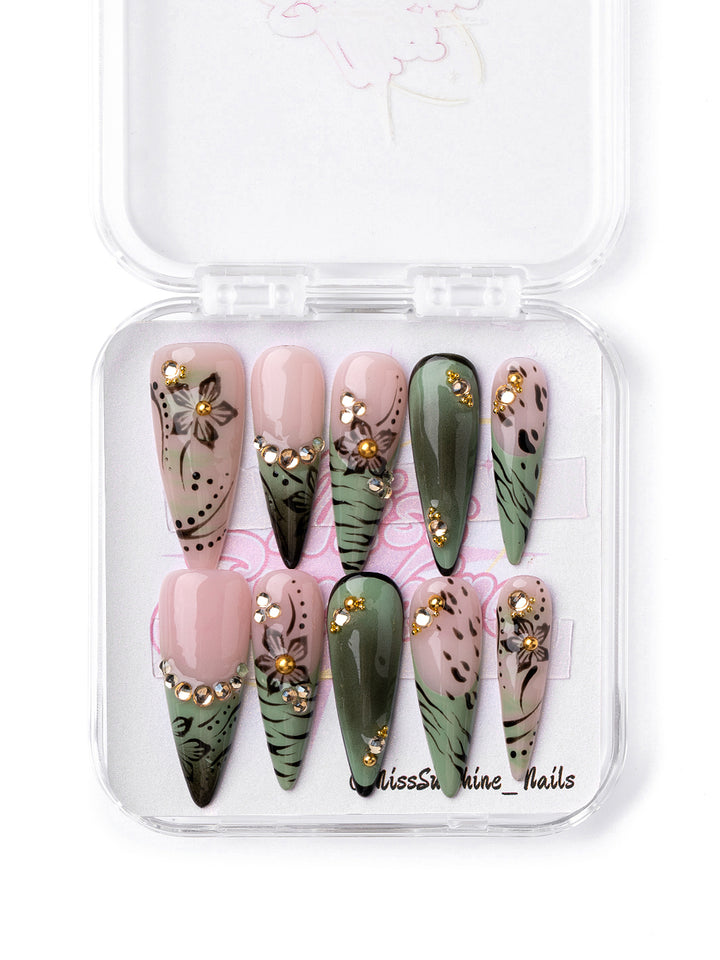 Olive Petal press-on nails with sage green floral designs and gold rhinestones