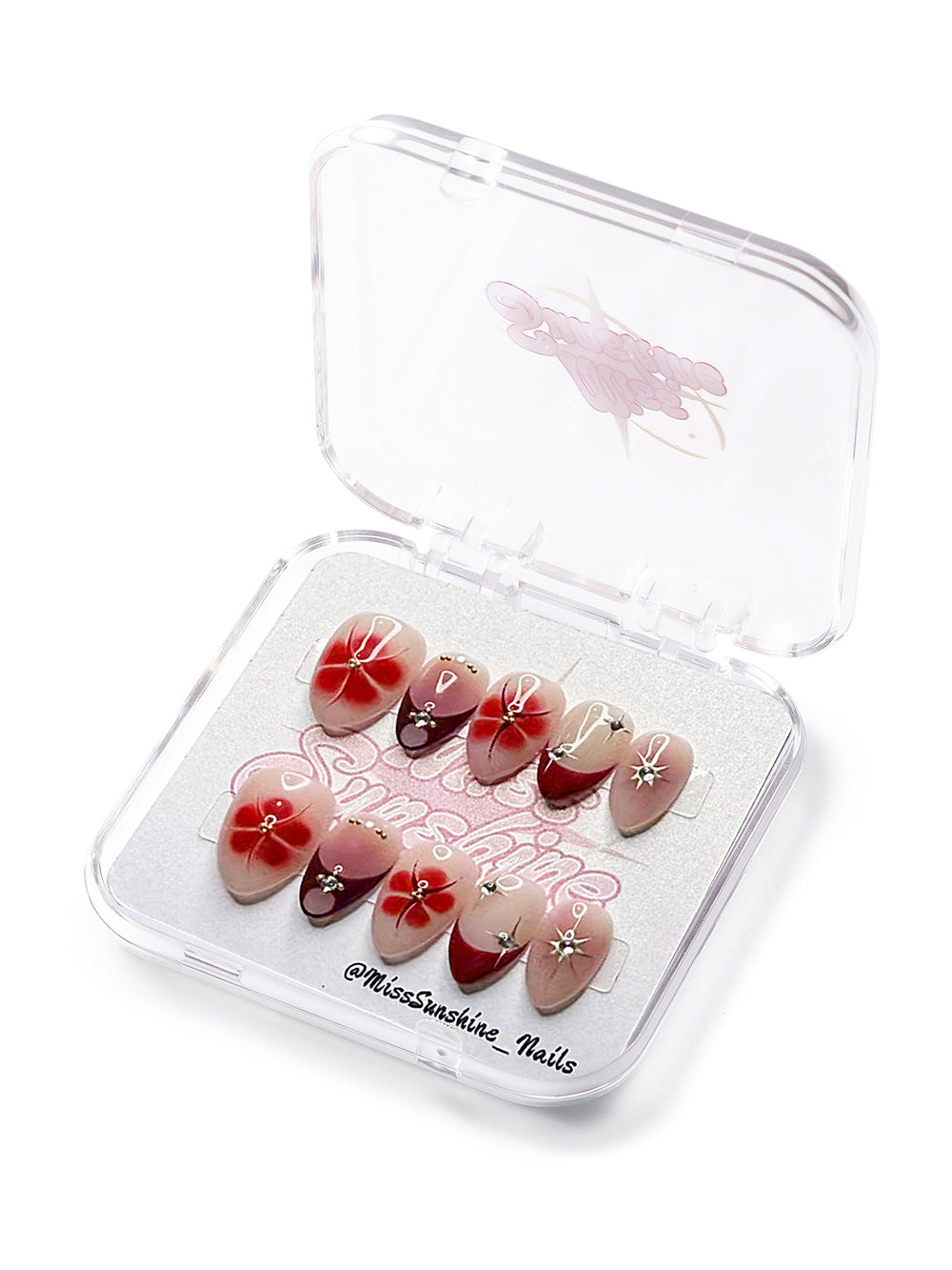 Ombre red and nude press-on nails with floral design