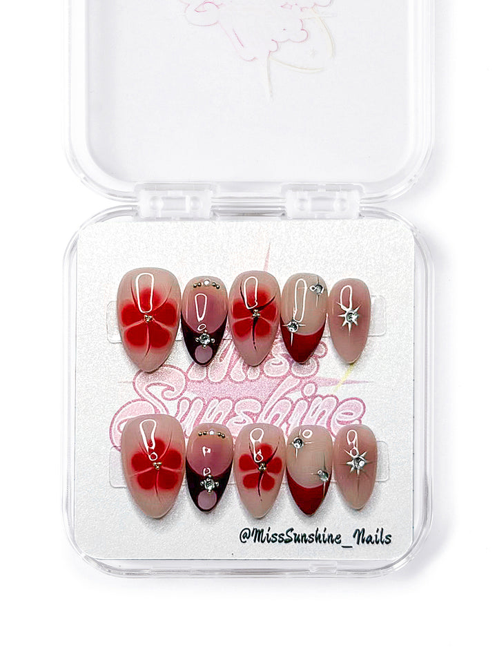 extra Short almond nails featuring hand-painted ombre flowers