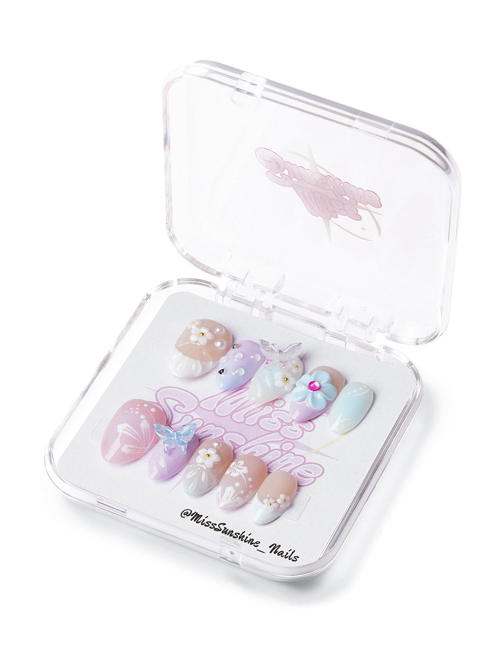 Extra short almond press-on nails with pastel pink, blue, and purple, 3D butterflies, and floral accents