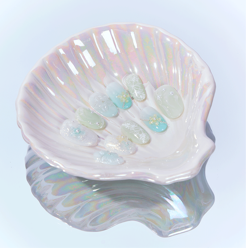 Pastel oval nails with pearls