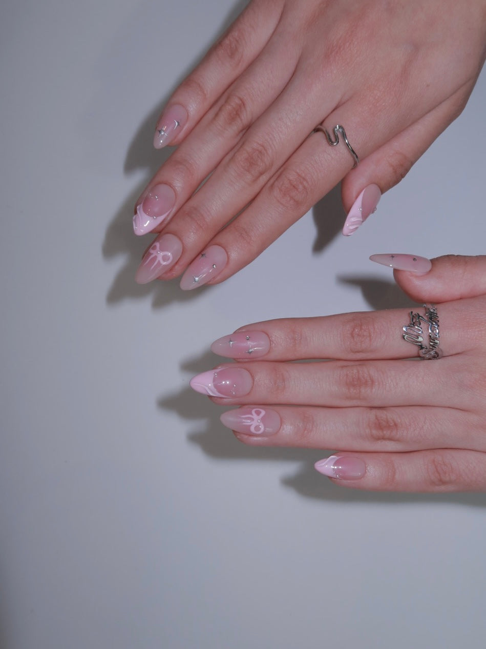 Short almond nails pink swirls