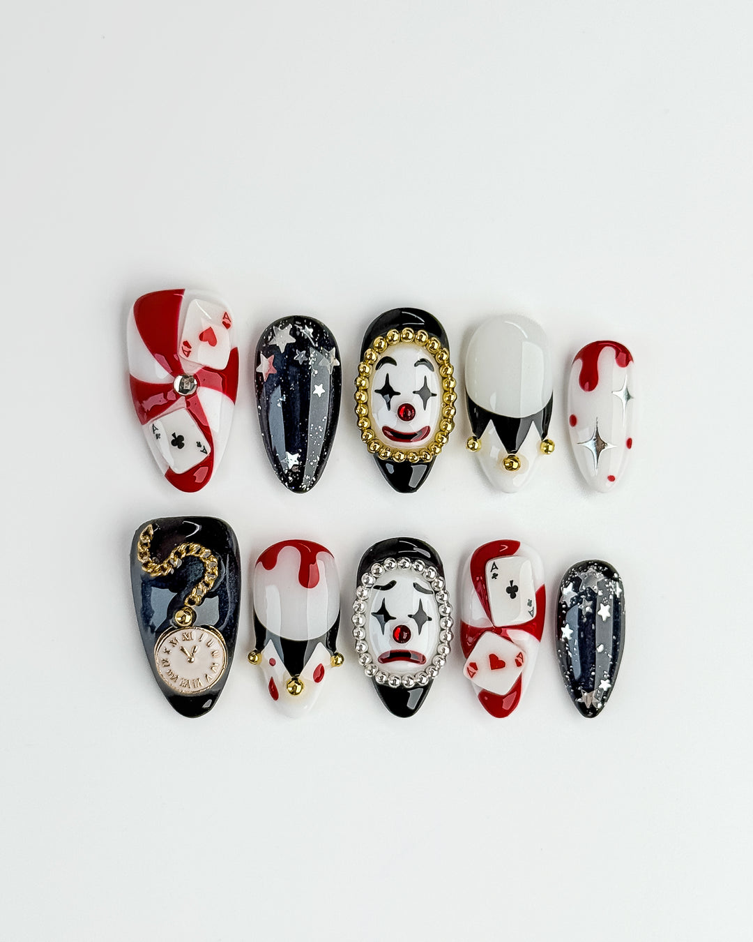 Poker Clown Halloween press-on nails with creepy clown faces and playing card designs