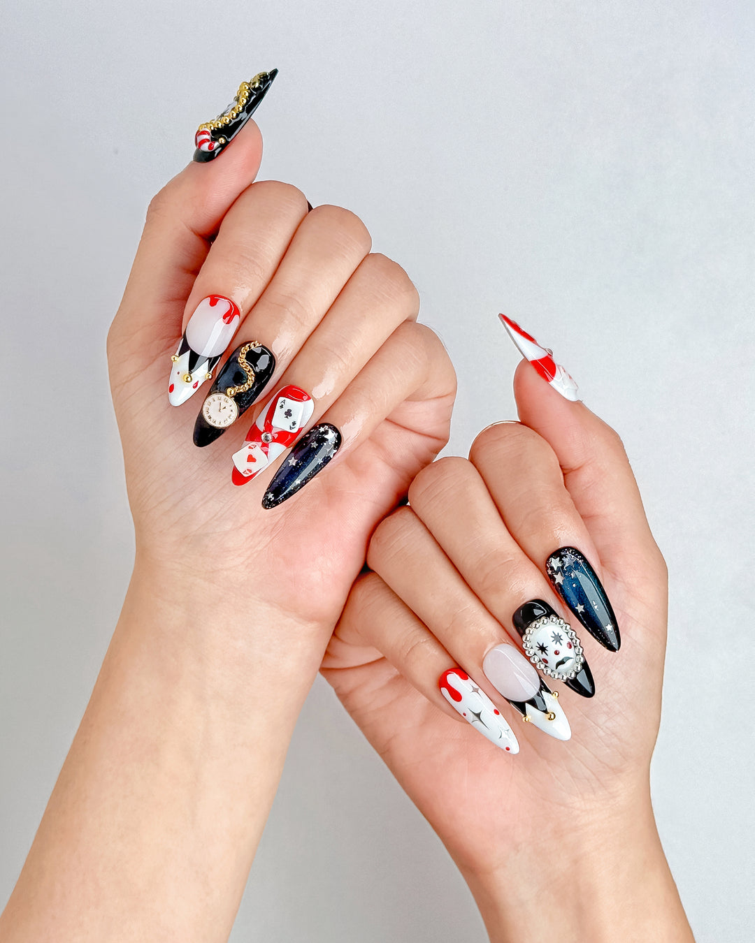 Poker Clown nail set featuring black, red, and white circus-inspired Halloween designs