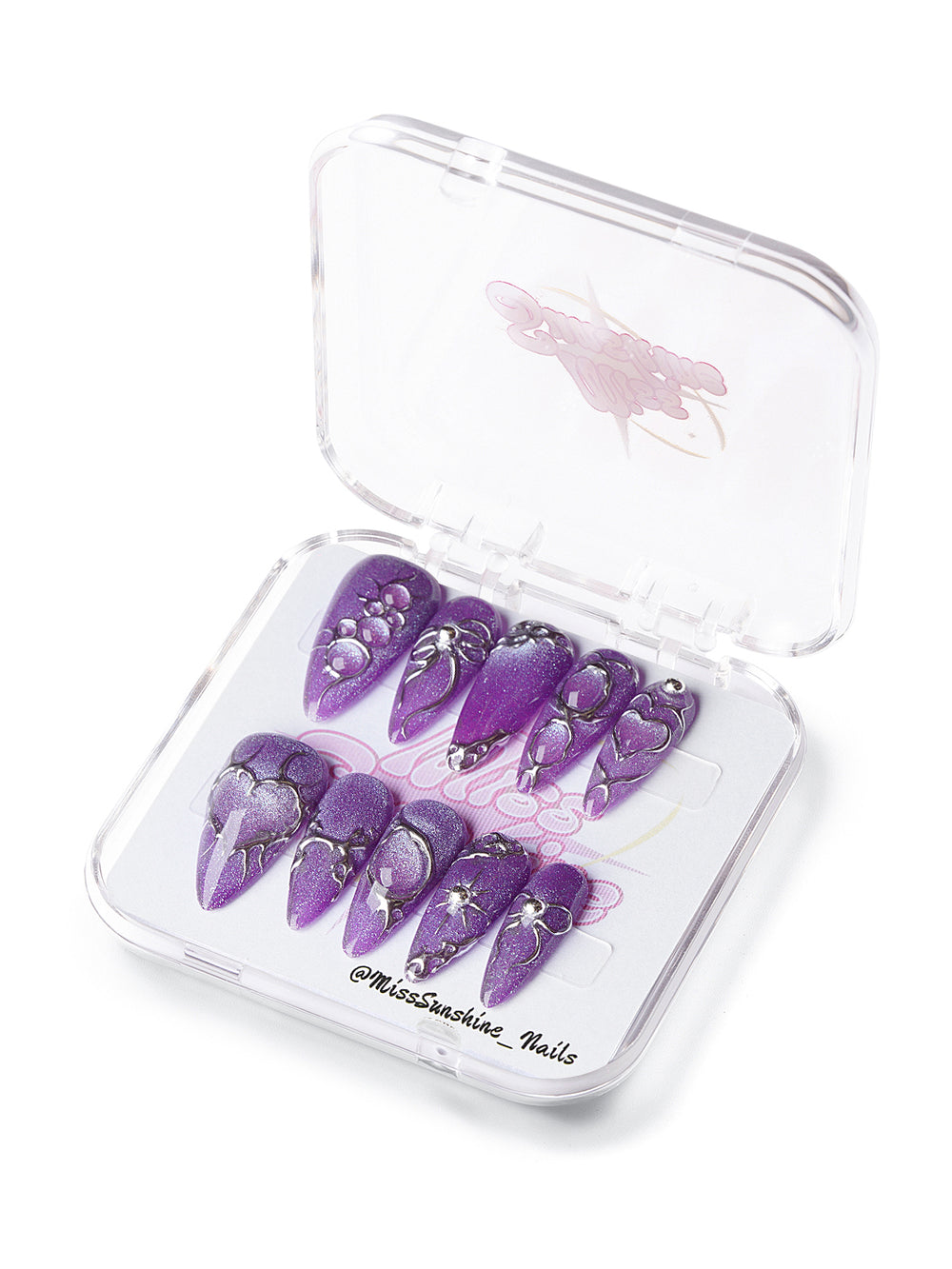 long almond press-on nails in metallic purple with chrome web design