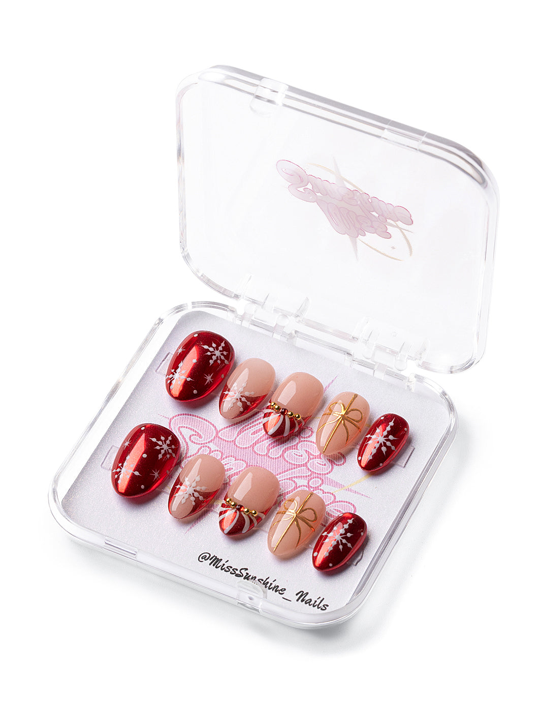 Extra short almond nails with red shimmer and snowflake details