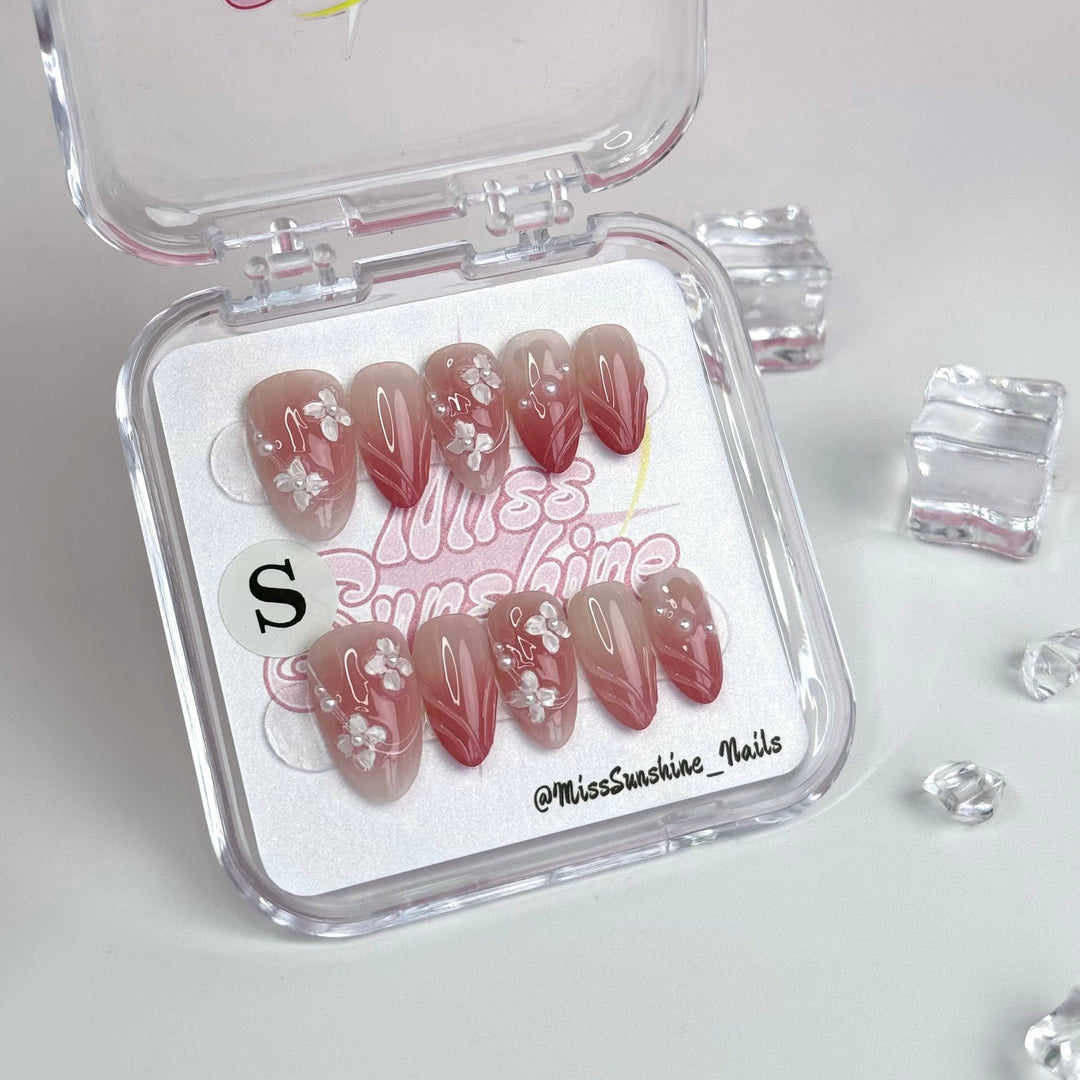 Romantic flower nail art on soft pink base