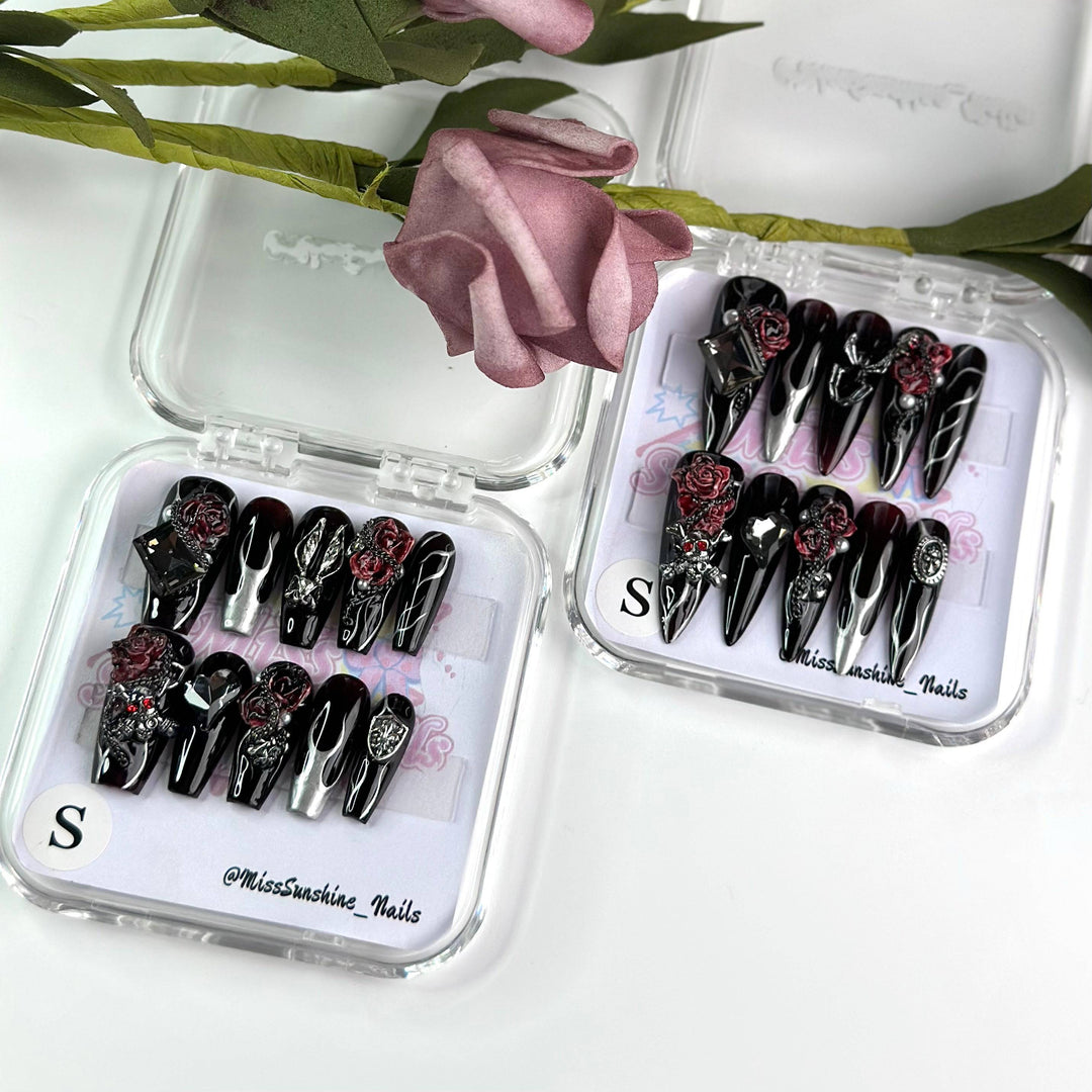 Long black nails with roses