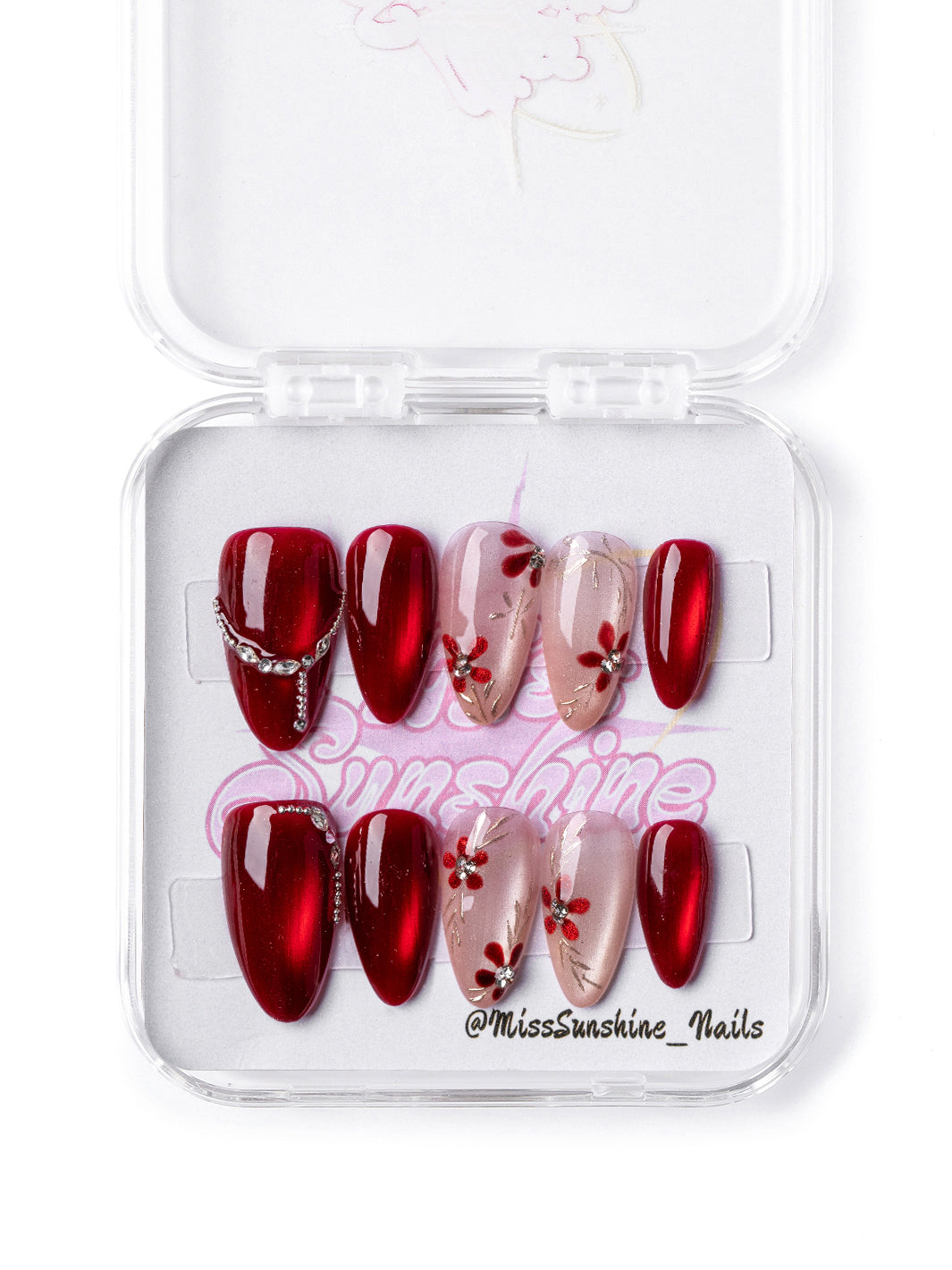 Close-up of handmade floral New Year nails by Miss Sunshine NYC.