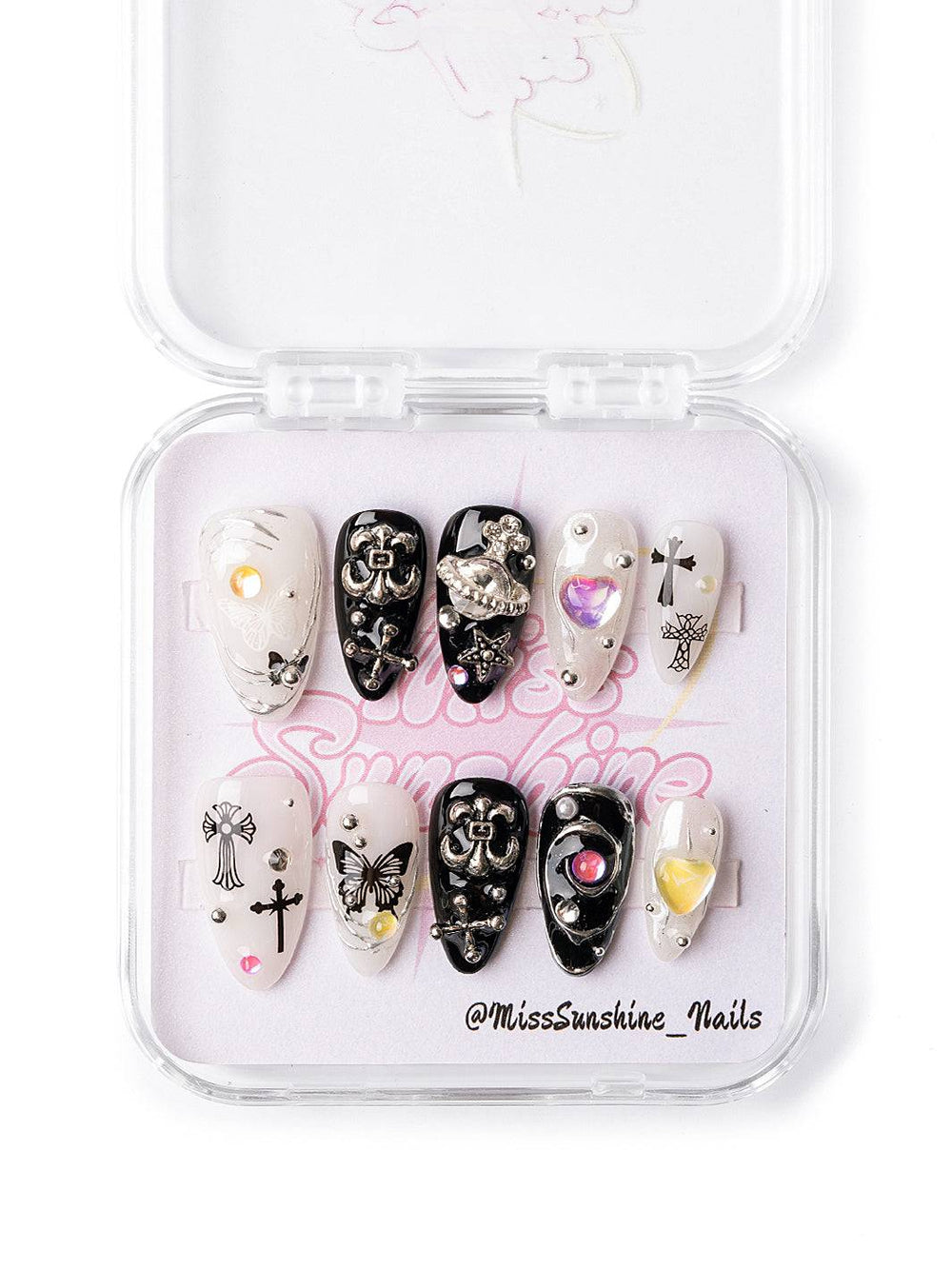 Black and white press-ons with angel wings and pearls