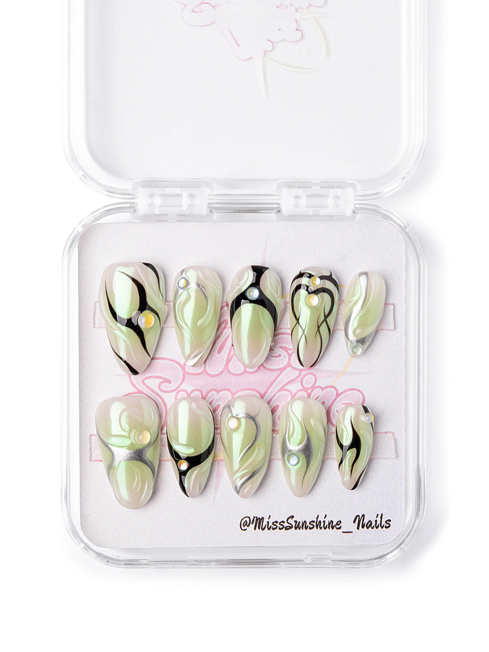 Short almond press-ons in pastel green tone
