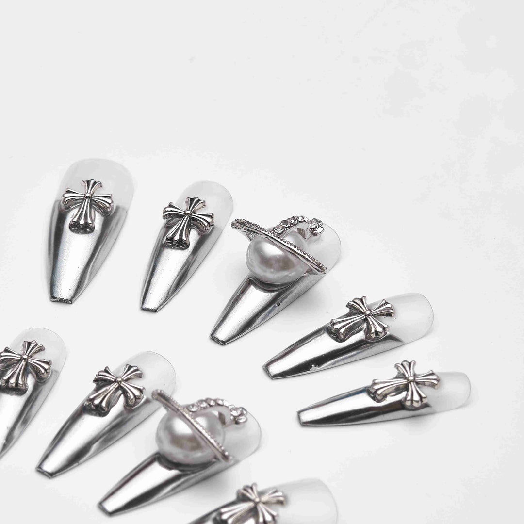 Long silver nails with crosses