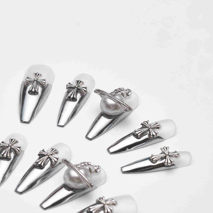 Long silver nails with crosses