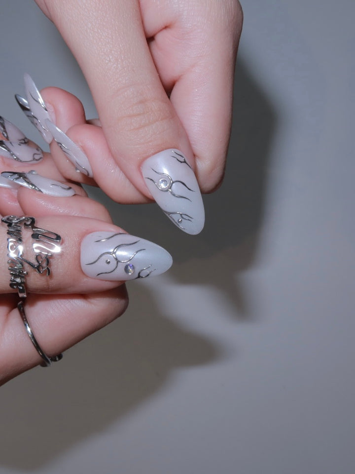 Metallic nude and silver nails