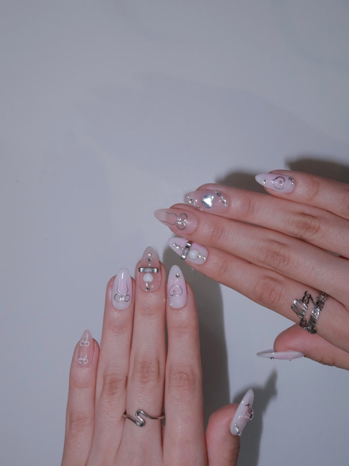 Soft girl nail design with glossy pink finish