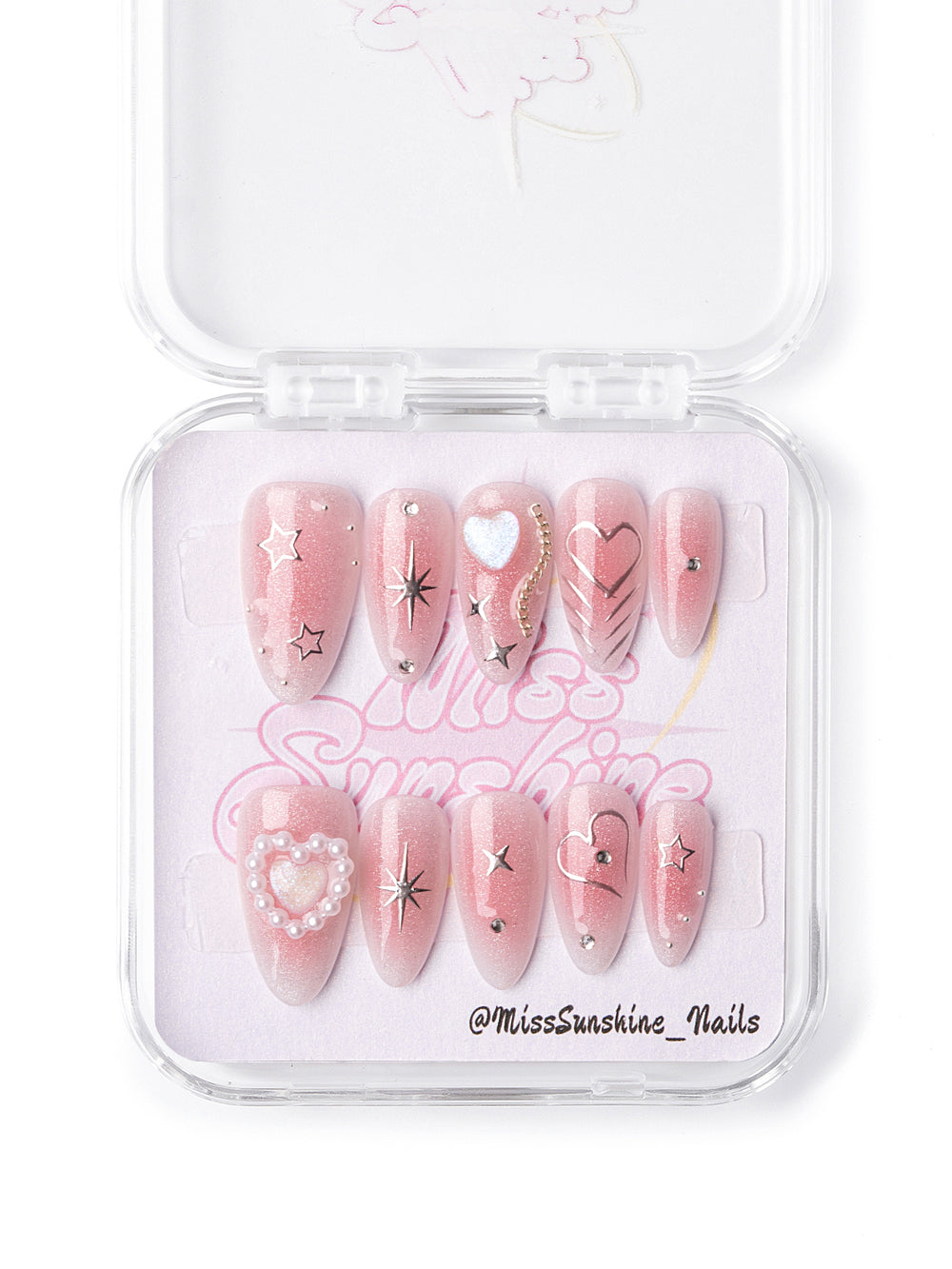 Blush nails with pearl heart and star accents